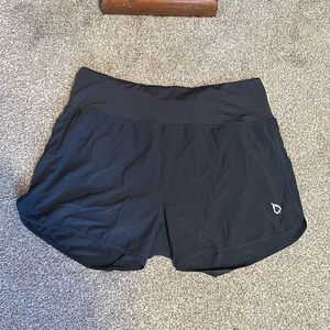 Black running shorts.